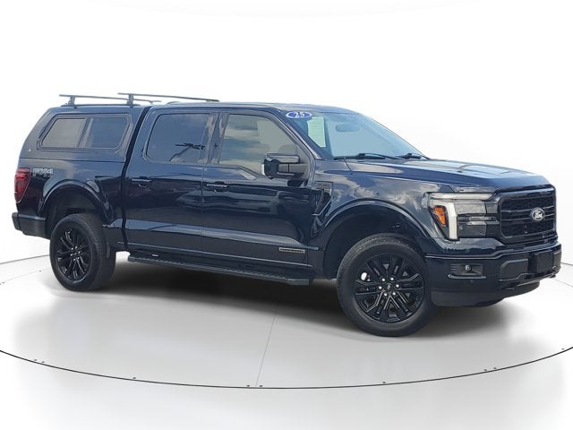 2025 Ford F-150 LARIAT in Antimatter Blue Metallic — front three-quarter view