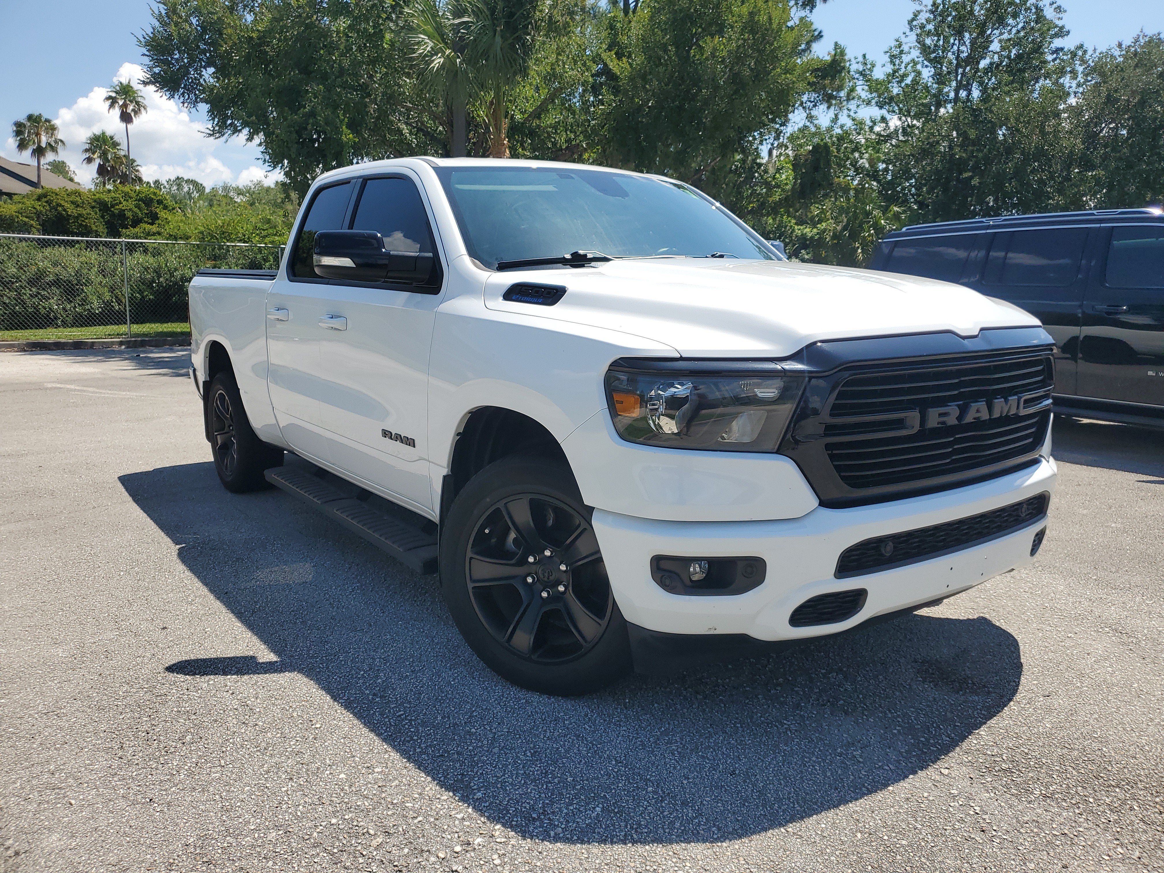 2021 RAM 1500 Big Horn in Bright White Clearcoat — front three-quarter view