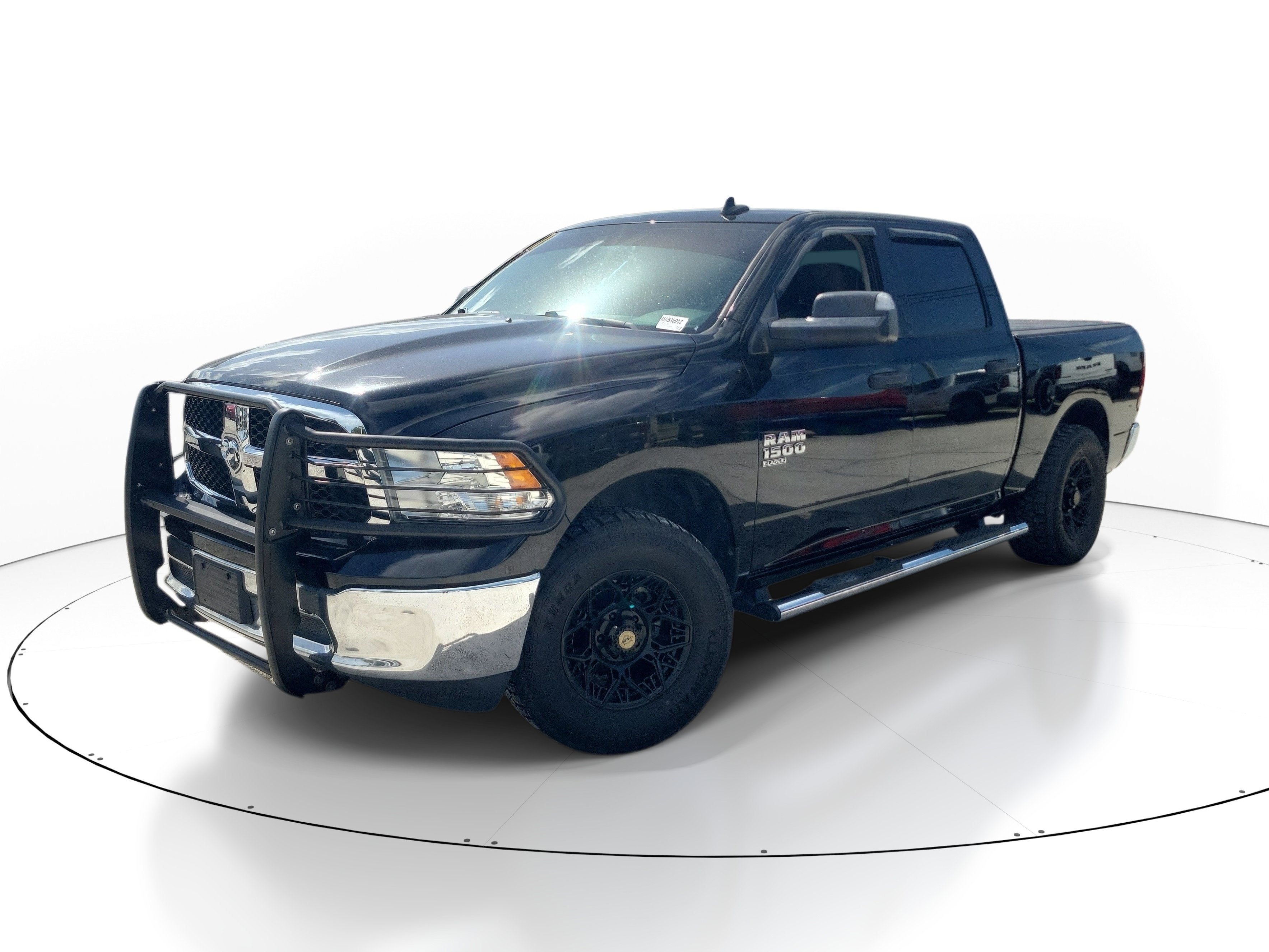 2021 RAM 1500 Classic Tradesman in Diamond Black Crystal Pearlcoat — front three-quarter view