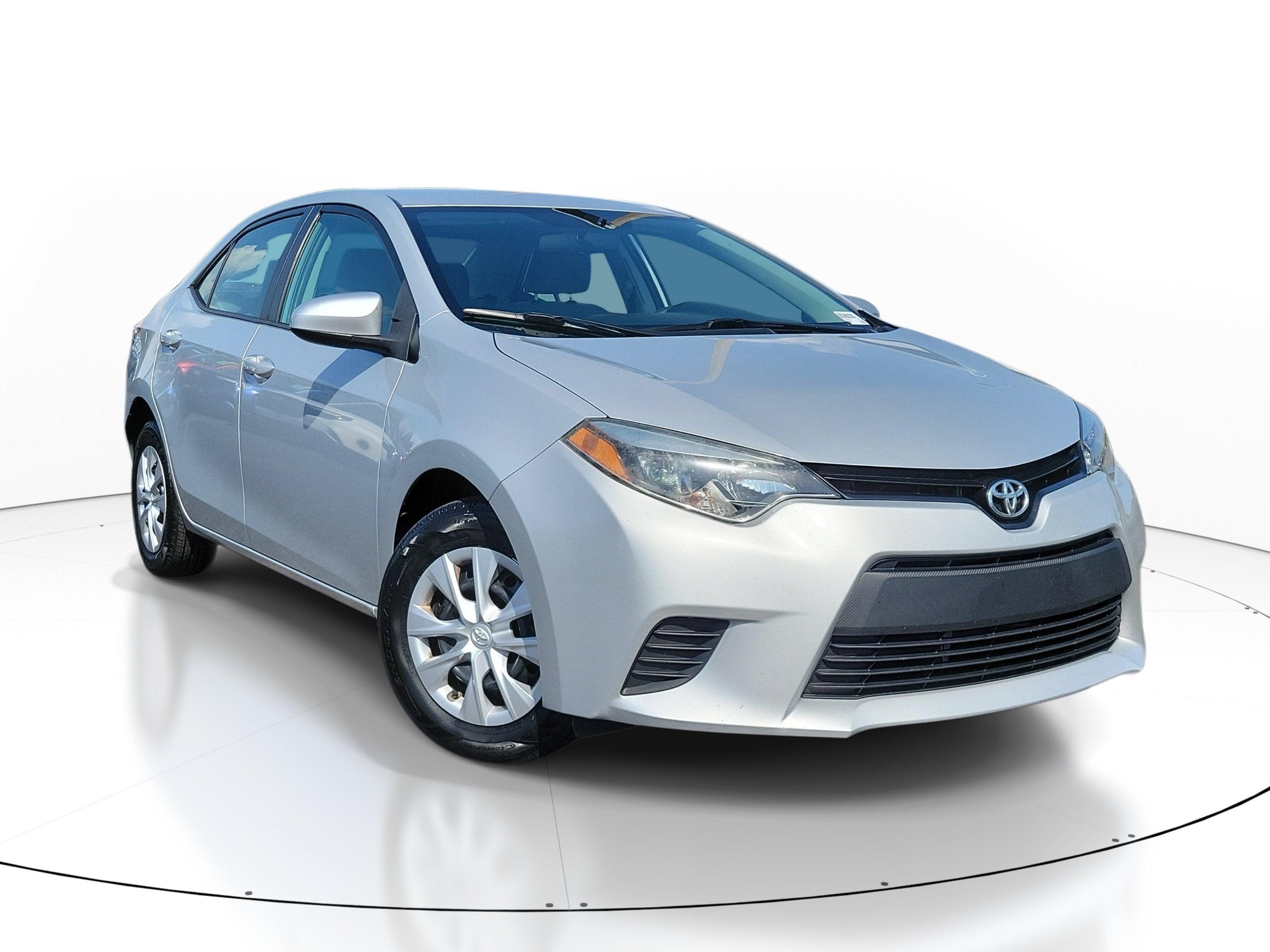 2016 Toyota Corolla L in Classic Silver Metallic — front three-quarter view