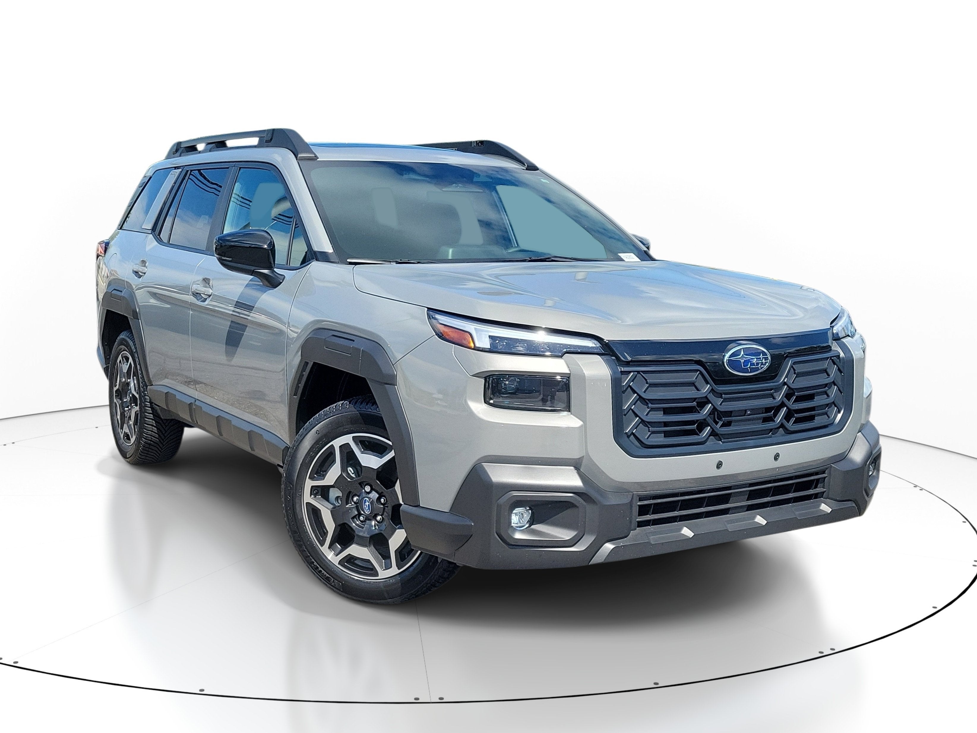 2026 Subaru Outback Touring in River Rock Pearl — front three-quarter view