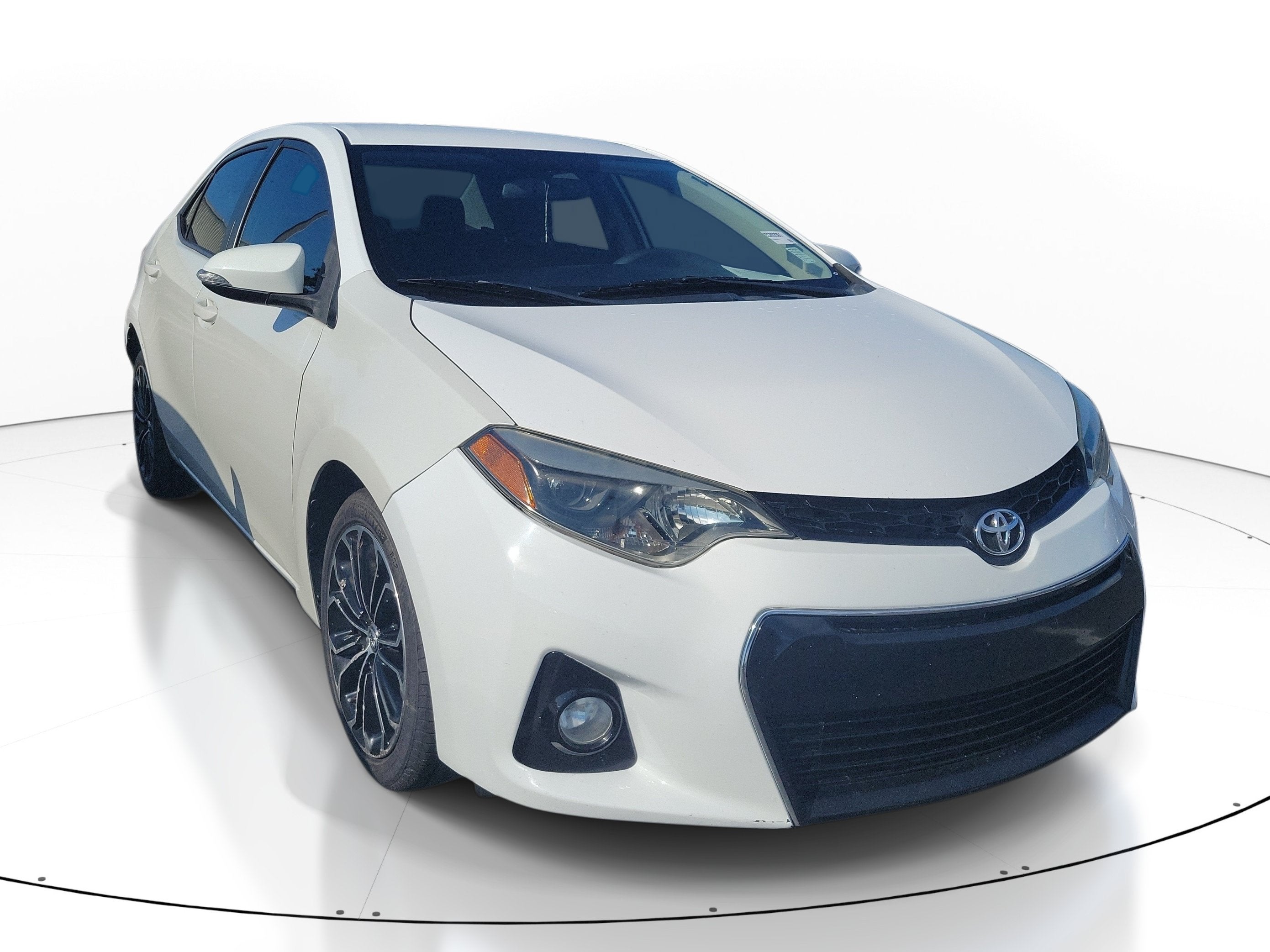2014 Toyota Corolla S Plus in Super White — front three-quarter view