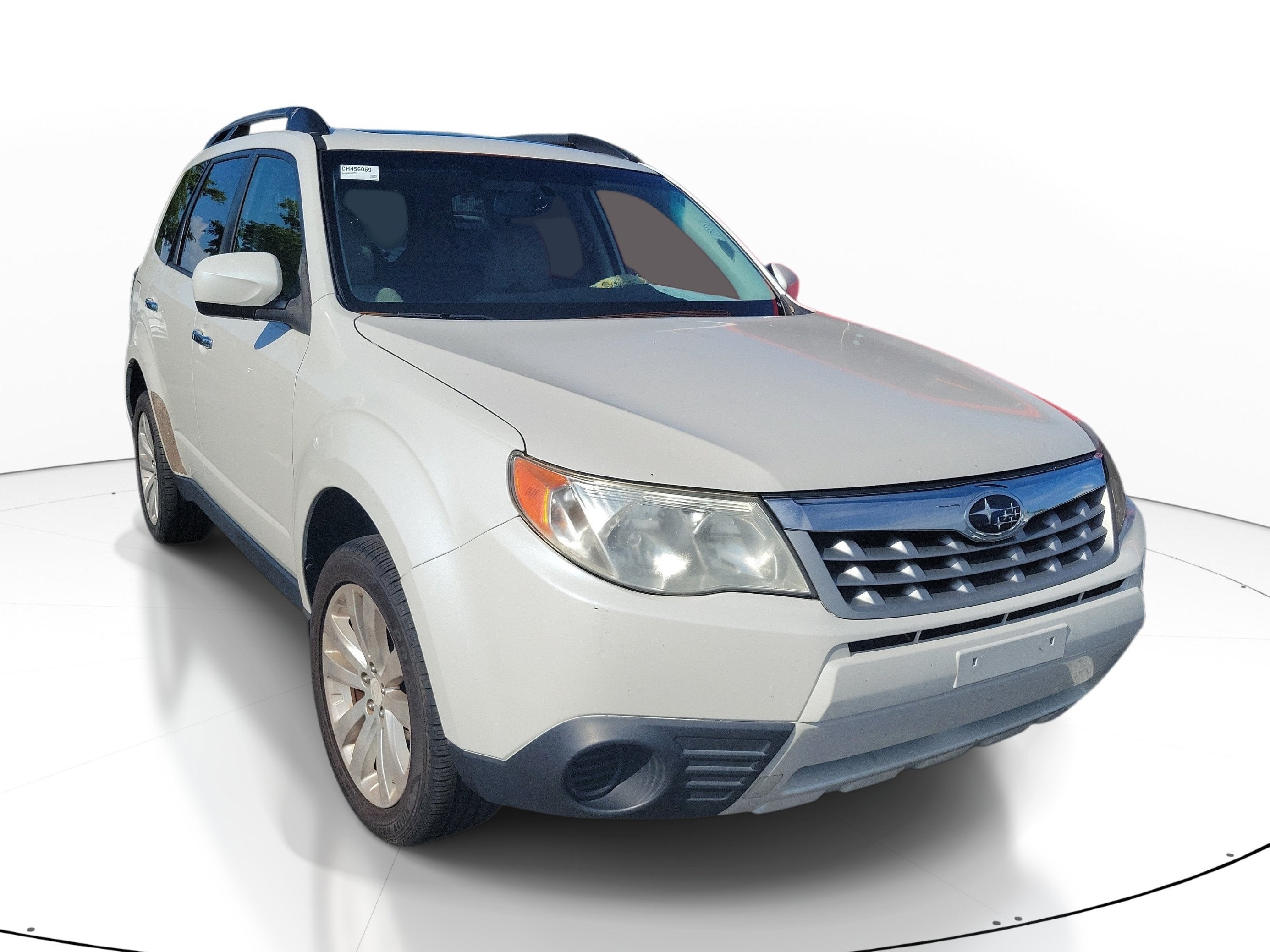 2012 Subaru Forester 2.5X in Satin White Pearl — front three-quarter view